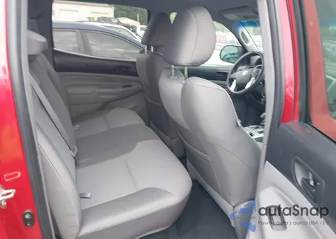 2015 Toyota Tacoma Base V6 z USA, uszkodzony, nr VIN 3TMLU4EN3FM197975